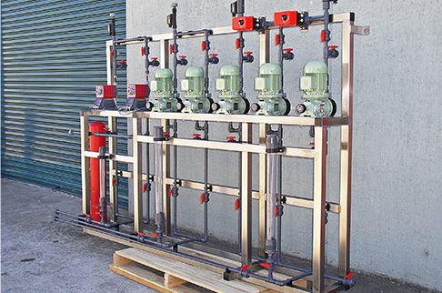 Custom built aluminium dosing skid motorised Iwaki LK metering pumps for water treatment plant.